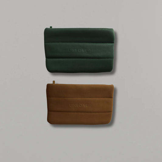 LINEONE Hair The Carry On puffy quilted pouches in hunter green and tan-camel with embossed logo