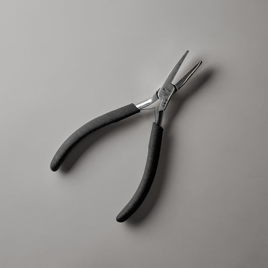 LINEONE Hair Keratin Bond Removal Pliers with stainless steel jaws and textured black grip handles
