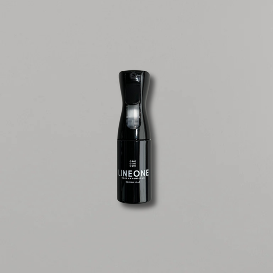 LINEONE Hair The Mr. Spray Bottle in glossy black continuous-mist plastic with white logo