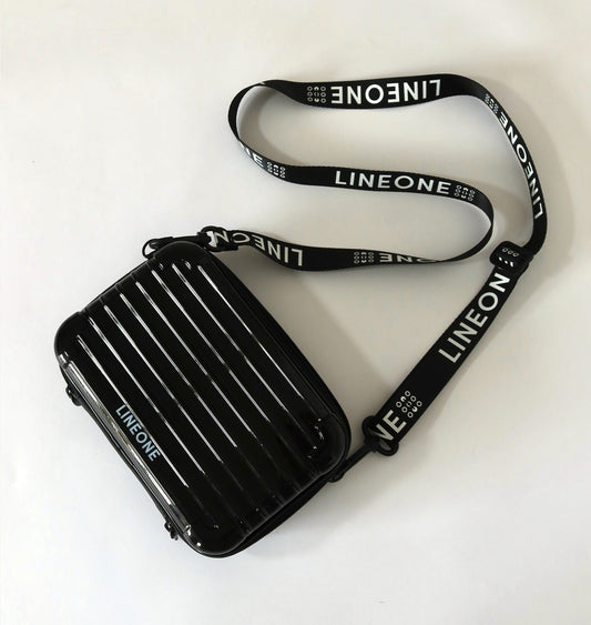 LINEONE Hair Weft Extension Toolkit closed black hard-shell case with LINEONE branded crossbody lanyard
