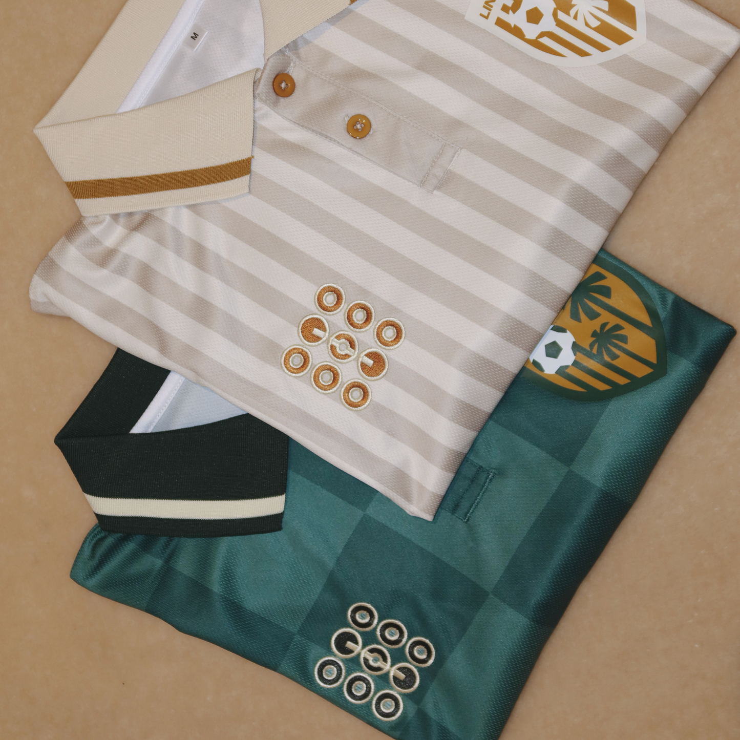 LINEONE Hair Team Works Jersey home and away kits folded together showing button placket detail