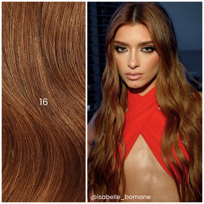 Editorial shot of model with LINEONE Hair 16 Natural Copper (Level 7) extensions, long warm copper waves in red top
