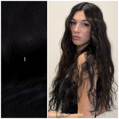 Model with LINEONE Hair 1 Jet Black extensions, long voluminous wavy jet black hair beside dark hair swatch