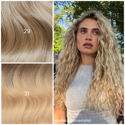 Outdoor portrait of model with LINEONE Hair 29 Medium Dimensional Blonde extensions, voluminous curly blonde hair