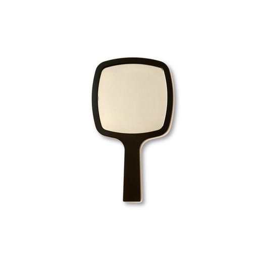 Front view of the LINEONE Hair Mirror with rounded black frame and short handle on white