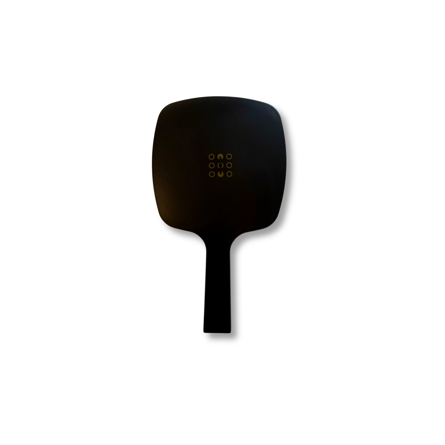 Back of the LINEONE Hair Mirror showing gold-embossed 8-dot logo mark on matte black