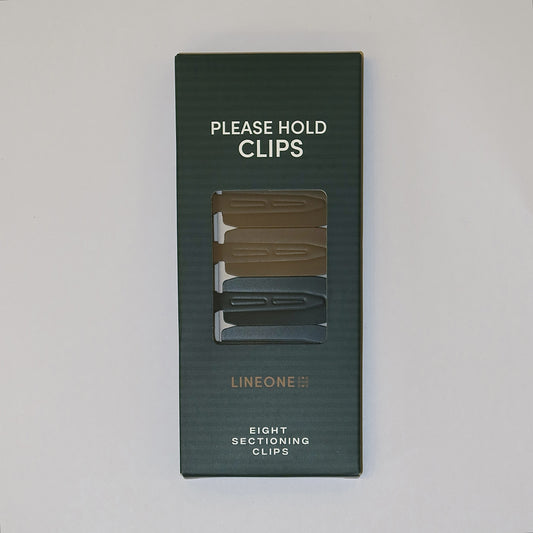 LINEONE Please Hold Clips product packaging - dark green box showing 8 sectioning clips in olive and slate tones on light gray background