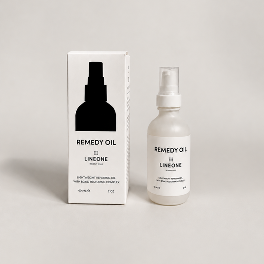LINEONE Hair Remedy Oil white pump bottle beside its retail box