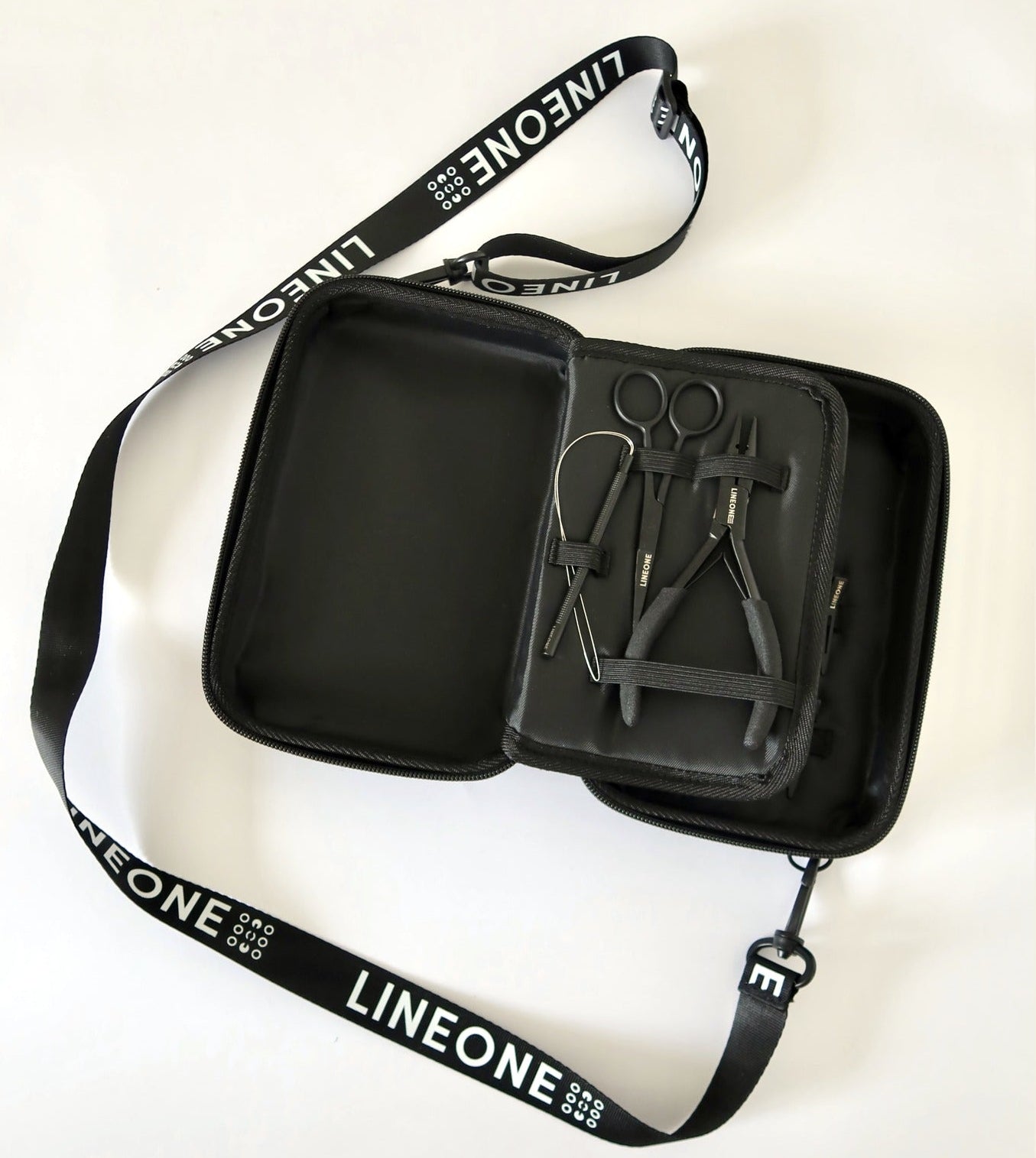 LINEONE Hair Weft Extension Toolkit open hard-shell case with weft tools and LINEONE lanyard